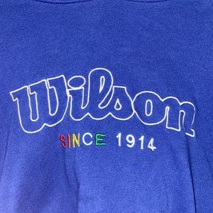 A blue “Wilson” hoodie that is very colorful, comfortable and warm.